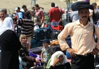 أزمة معبر الكرامة.. مطالبات بتمديد ساعات العمل وإلغاء المنصة
