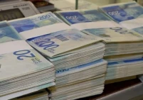 المجلس التنسيقي للقطاع الخاص يحمل إسرائيل مسؤولية أزمة تكدس الشيكل