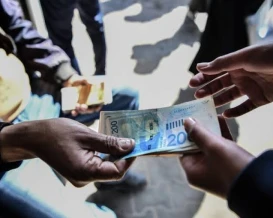 الاقتصاد بغزة تدعو للتعامل بالأوراق النقدية المهترئة